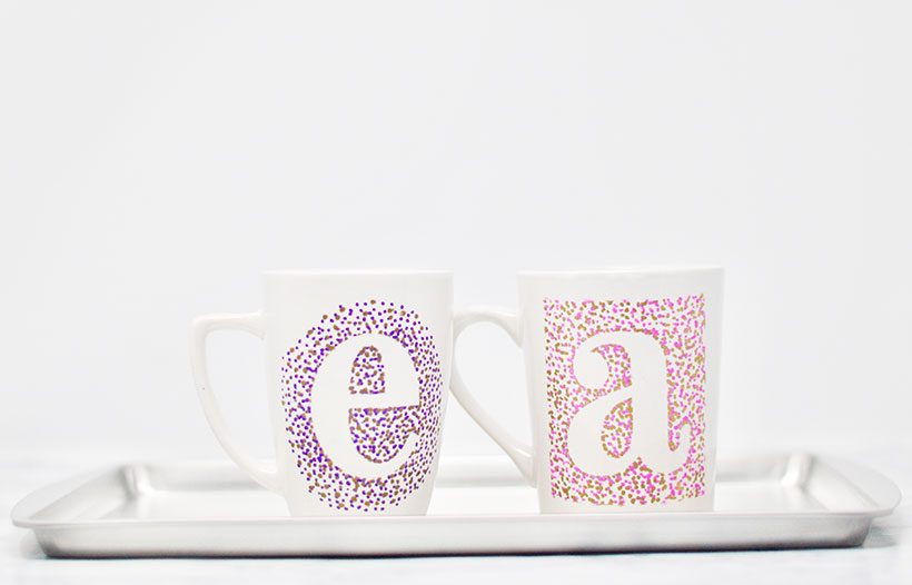 DIY Sharpie Mug Craft - mugs on cookie sheet, ready to bake